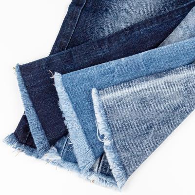 China Breathable 100% Cotton Denim Fabric 9.4oz Sweat-absorbent denim cambric fabric with straight twill and roving jeans fabric suppliers for sale