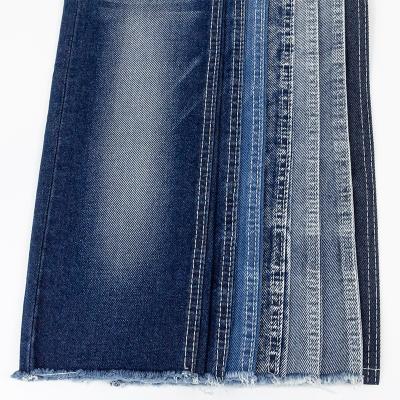 China Breathable Wholesale Jeans Stretch Twill Jeans Material 65% Cotton 33% Polyester 2% Spandex OE Material Selvedge Knit Denim Fabric Denim Yard Fabric for sale