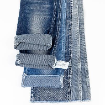 China 65% Cotton 33% Polyester 2% Spandex 8.3oz OE Light Breathable Twill Wholesale Jeans Material Selvedge Knit Cheap Price Denim Fabric for sale