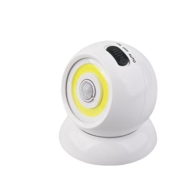 China Round shape 3AAA battery On--automatic 360 degree rotatable pir cob motion sensor light for sale