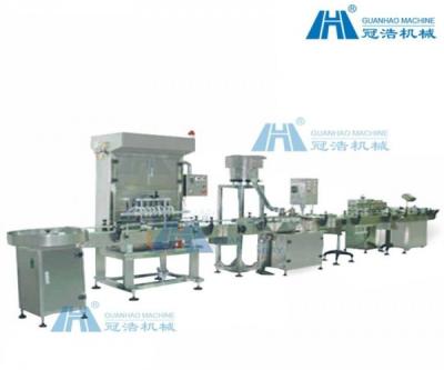 China Máquina de embotellado auto del aceite líquido con capsular/lacre/el etiquetado en venta