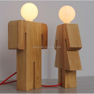 China Supplier New Product Modern People Body Shape China Wooden Table Lamp for sale