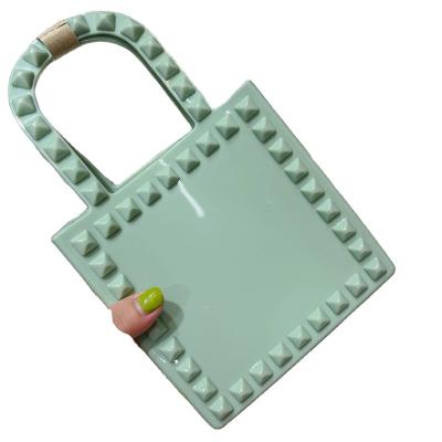 China 2022 Fashion PVC Jelly Square Rivet Bag Mini Handbag Single Shoulder Cross-bodybag for sale