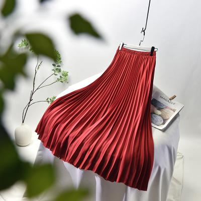 China New long high spring anti-static pleated skirt and summer solid color skirt female elastic waist skirt many colors for sale