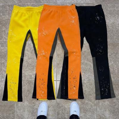 China Customized Labels Men's Jogger Track Sweat Pants Baggy Trousers Paint Splatter Stack Flared Sweatpants for sale