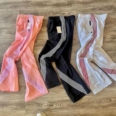 China pantalones de deporte grises de luz elástico de cintura de cierre de los hombres Y2K Streetwear pantalones de deporte de piernas anchas en venta