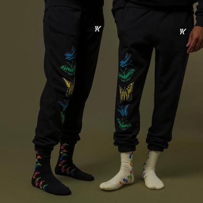 China Bolsillo lateral cintura elástica de verano primavera deportes corredores esposados pantalones de deporte para hombres activos en venta