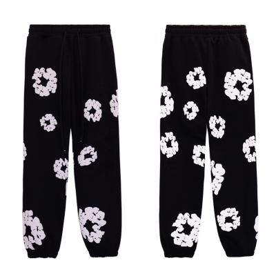 China Unisex Street Wear Pantalón de pista Bajo con logotipo de impresión de pulpa Kapok personalizado en lavado ligero en venta