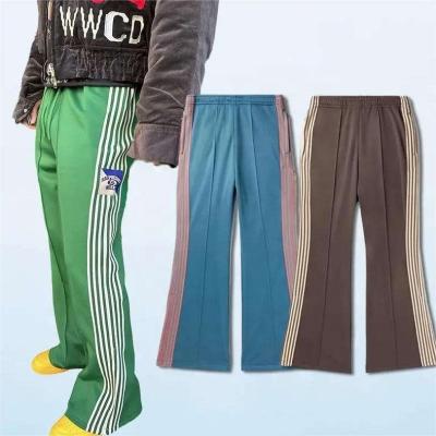 Chine Polyester/coton Y2K Hommes Femmes Coureurs occasionnels avec des jambes larges élargies et des bandes latérales à vendre