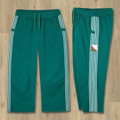 China Custom Mens Sweatpants with Customized Labels Wide Leg Track Pants and Side Stripes for sale