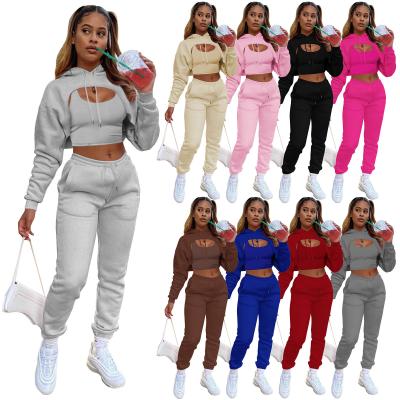 China Gedrukte roze vrouwen trainingen 3 stukken set Crop Top Hoodie en joggers Cropped Hoodies Te koop