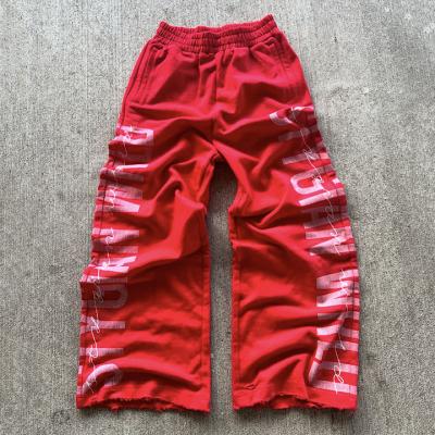 Chine Pantalons de survêtement pour hommes Jogger personnalisé Logo imprimé sur le côté Sac de coton poids lourd à vendre