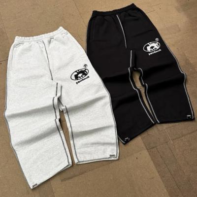 China Customizado 500 Gsm Francês Terry Wide Leg Sweatpants bordado ajustável cordão de tração algemada Saco de pista calças para homens à venda