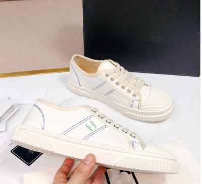 China CUSHIONING 2021 spring and wild flat sports shoes canvas shoes new small summer wind low biscuit ladies shoes for sale