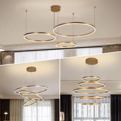 China Quality Raw Material DLSSLIGHTING European Style Simple Gold Color Circle Rings Acrylic LED Pendant Light Indoor Hanging Modern Chandeliers for sale