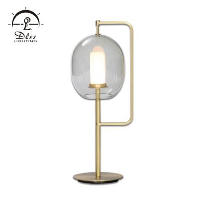 China Contemporary Retro Chinese Style Restaurant Hotel Decorative Iron Glass Led Table Lamp for sale