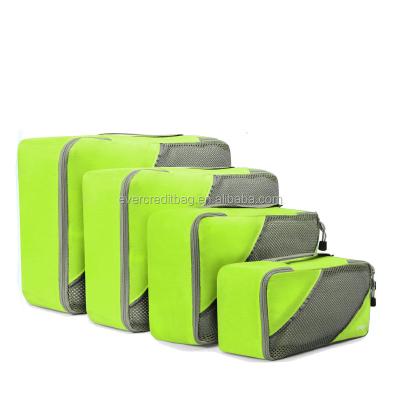 China Polyester 4 In 1 Foldable Compressed Travel Expanded Cubes Storage Tote Bag For Travel for sale