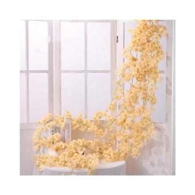 China Modern Hanging Silk Artificial Flower Cherry Blossom Vine For Sale Vine Wedding Decoration for sale