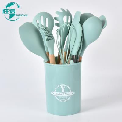 China Hot Selling Viable 9 Piece Silicone Kitchenware Gift Handle Cover Device Set Cooking Spoon and Soup Spoon for sale