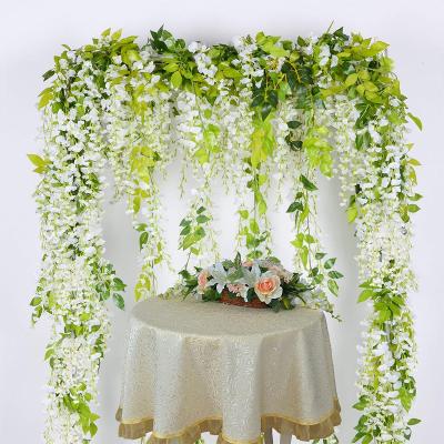 China Modern Artificial Vines Silk Wisteria Garlands Hanging Flower Arch Wedding Purple Wisteria White Artificial Garland for sale