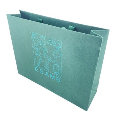 China OEM Special Paper Biodegradable Luxury Jewelry Gift Packaging Bag With Handle Foil Business Shopping Packaging Hot Stamping Paper Bag for sale