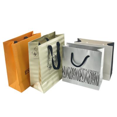 China Luxury Biodegradable Custom Business Shopping Gift Packaging Bag Factory Wedding Packaging Bag Special Paper Bag for sale