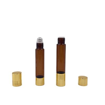 China Personal Care 10ml Double Ended Empty Amber Glass Perfume Essential Oil Roller Bottles With Steel Trackball for sale