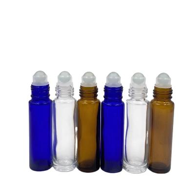 China New Personal Care Essential Blue 10ml Clear Amber Glass Bottle For Essential Oils With Stainless Steel Rollerball for sale