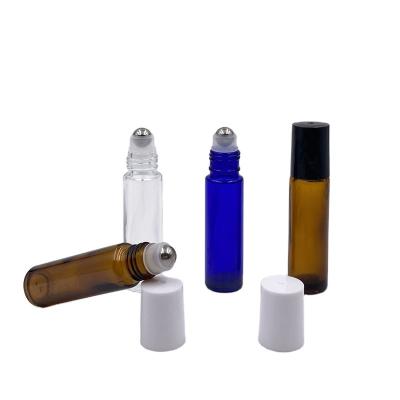 China Personal Care Oil Color Glass Packaging Perfume Bottle With Stainless Trackball for sale