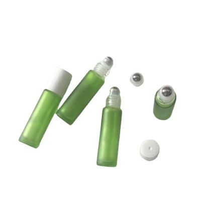 China Personal Care In Stock Frosted Green Black Glass Perfume Roller Bottle With Matte White Cap 10ml for sale