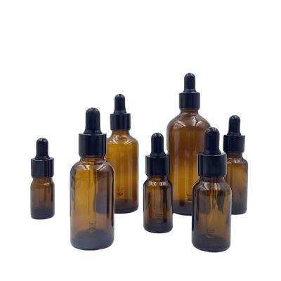 China Personal Care In Stock Wholesale 5ml 10ml 15ml 20ml 30ml 50ml 100ml Round Dropper Amber Glass Bottle Aromatherapy Bottle for sale