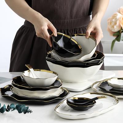 China Modern Nordic ceramic bowl with gilt edge, creative leaf edge lotus food salad soup multifunctional western rice bowl for sale