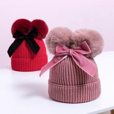 China Neutral / both men's and women's autumn winter new cotton woolen double pom pom hat hot wholesale for sale