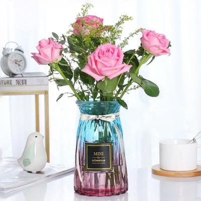 China 2020 Nordic hot sales mini Amazon style transparent rock clear glass flared flower vase for wedding decor for sale