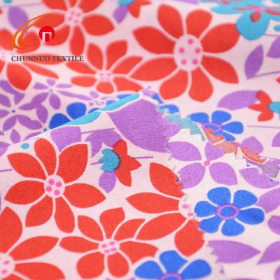 China Chunnuo Antistatic Textile Hot Sale 100% Polyester Flower Printed Satin Woven Fabric for sale