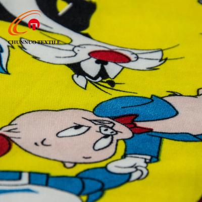 China Wholesale Memory Cartoon Print Milk Double Brushed Jersey Fabric For Garment for sale