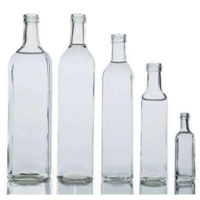 China Xuzhou China Factory OEM Storage ES40 Glass Beverage Packing Bottle With Screw Lids for sale