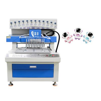 China 12 Color Automatic Shoe PVC Patch Making Machine Silicone Product Dispenser Plus Model for sale