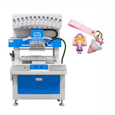 China 12 Color Pvc Dispenser Dripping Molding Machine For Pvc Patches Making for sale