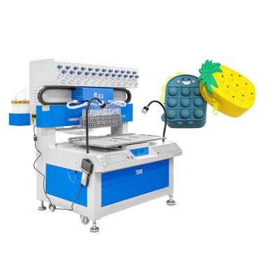 China Silicone en PVC patch maken machine met 24 kleuren automatische kleurstof dispenser Te koop