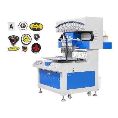 China 18 Colors Rubber Product Making Machinery for 3D PVC Logo Label Soft Rubber Patch for sale