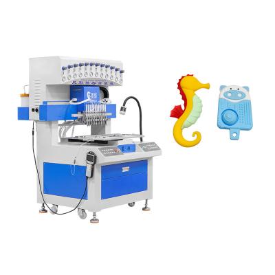 China 12 Colors PVC Silicone Patch Machine PVC Keychain Machine for sale