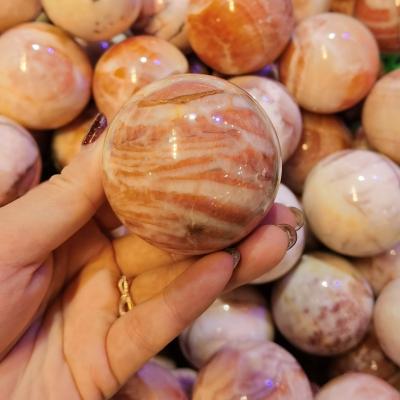 China Wholesale China Folk Crafts Healing Feng Shui Healing Rhodochrosite Stone Crystal Open Quartz Ball Crystal Sphere for sale