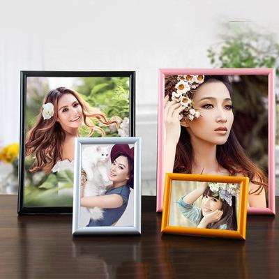 China Plastic wholesale plastic photo frame Direct selling home textile home decoration home studio decoration wedding photo 4k Picture Frame for sale