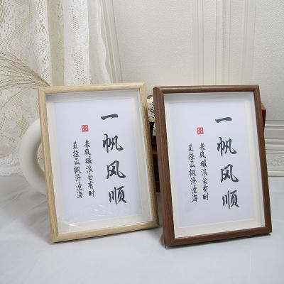 China Modern Simplicity Calligraphy Photo Frame A4 Wood Inspired Photo Frame Customized Wall Hanging Mounted Picture Frame In Stock for sale