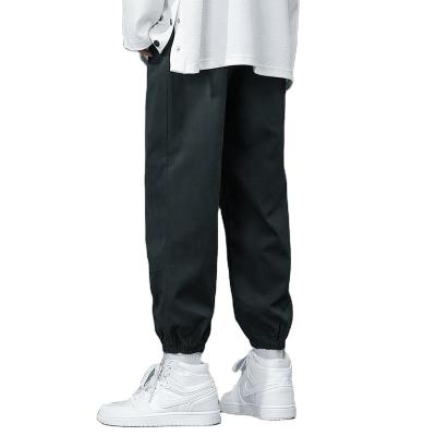 China High Quality Anti-Wrinkle Loose Drawstring Men's Joggers Trousers Casual Pants Pure Color for sale