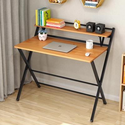 China 2022 Foldable New Wooden Office Desk Family Study Desk With Small Metal Shelf for sale