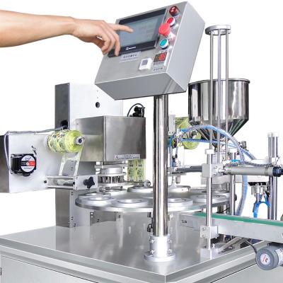 China Auris Semi Automatic Food Cup Ice Cream Waffle Filling Machine Manual Filling Ice Cream Machine Robot for sale