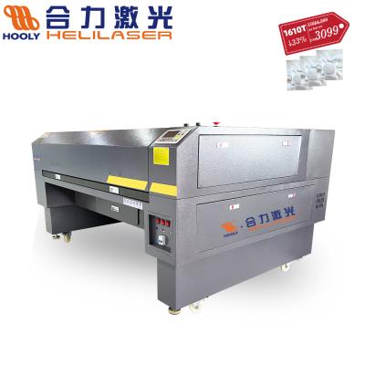 China Laser CUTTING Dongguan high speed hooly automatic laser fabric cutting machine for fabric, 60w laser cut machine for sale