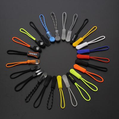 China Other High Quality Custom Colored PVC Clothing Plastic Logo Plastic Zipper Sliders Zipper Pullers Rope for sale